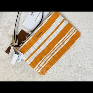Authentic Coach retail style wristlet